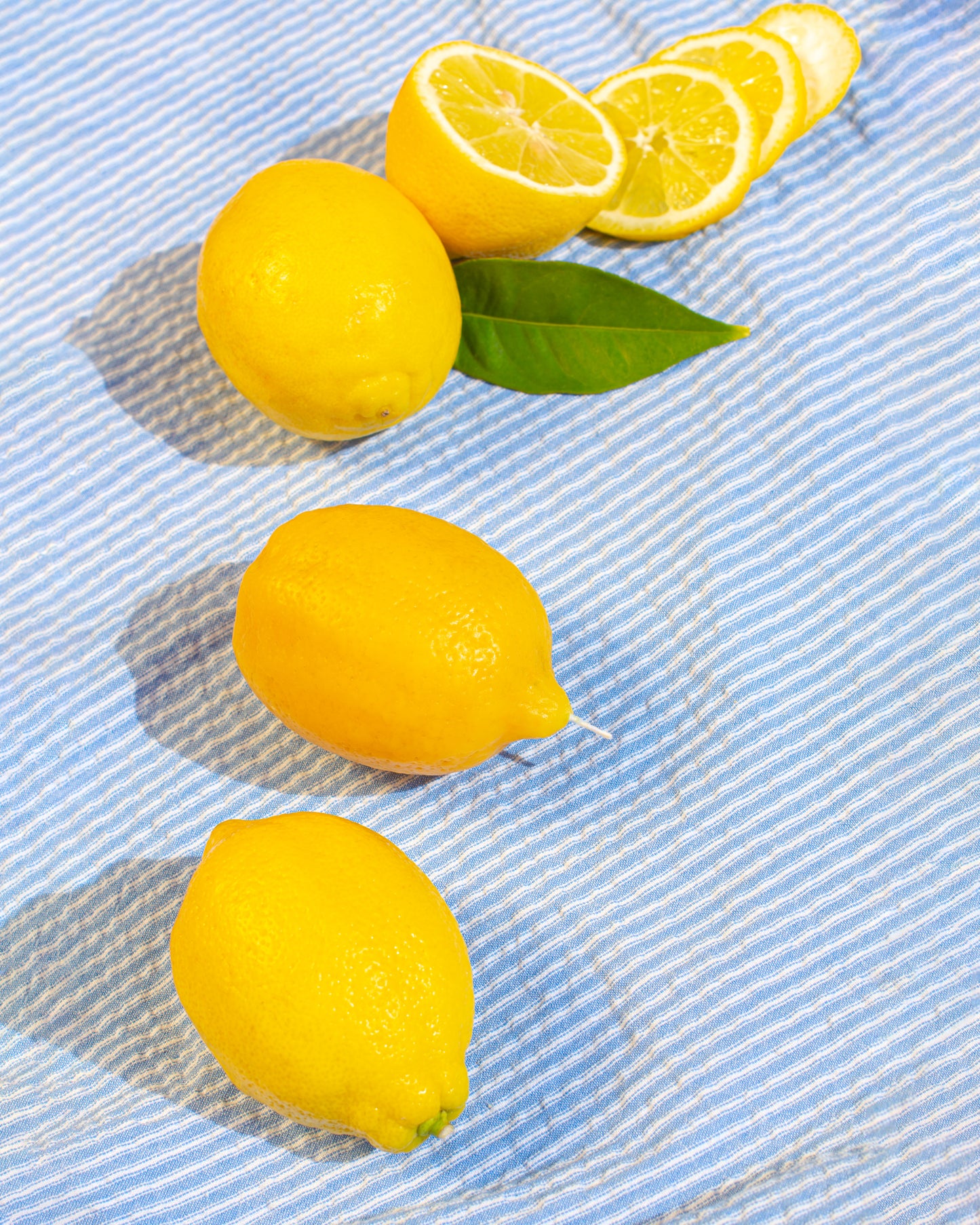 Beeswax candle shaped like a whole lemon