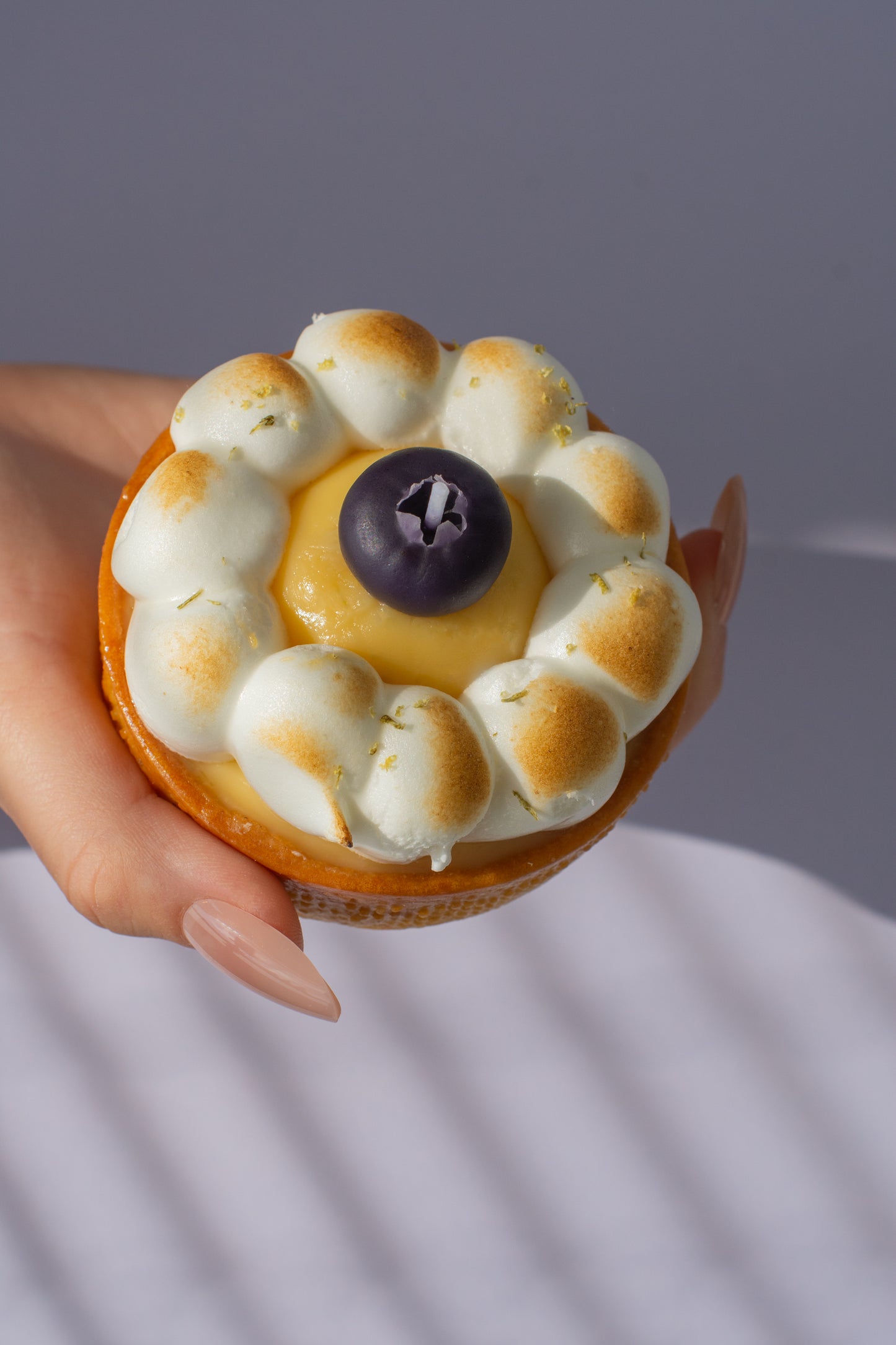 Decorative blueberry candle perfect for table styling