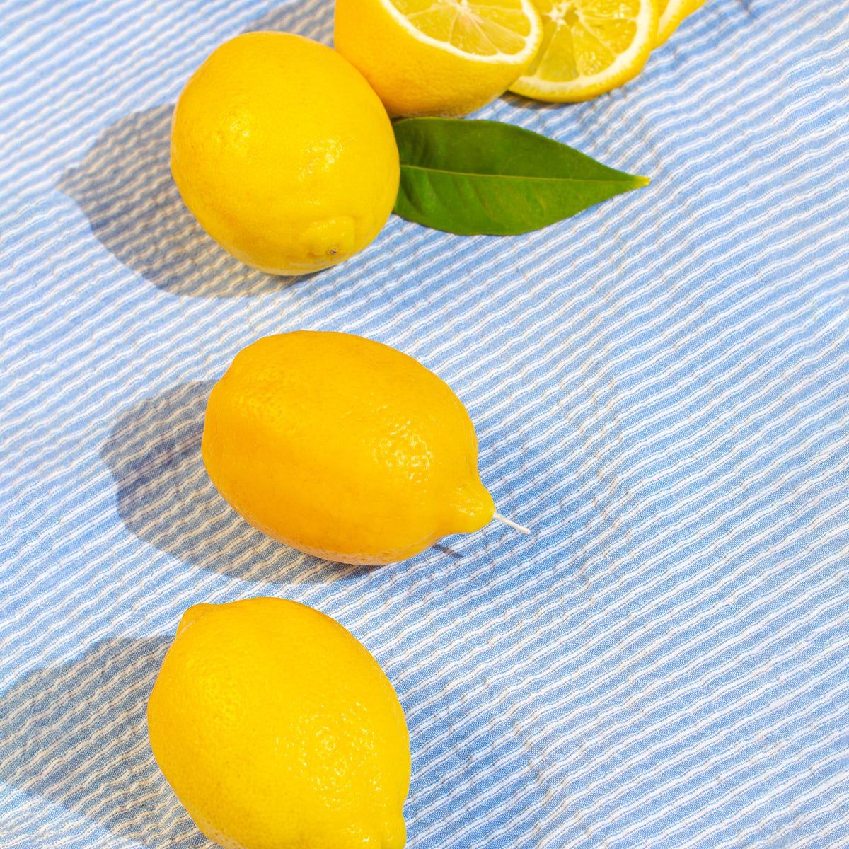 Beeswax candle shaped like a whole lemon