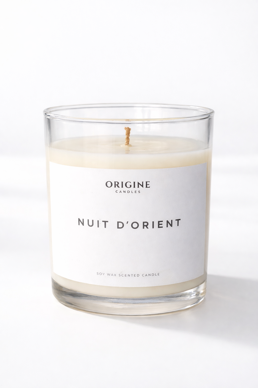 Premium home fragrance candle with sweet vanilla and woody amber scent for relaxing evenings